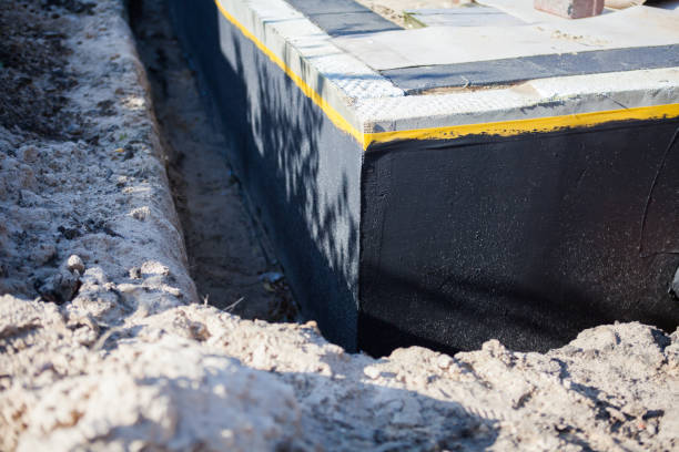 Professional Waterproofing technician working in Van Buren, IN